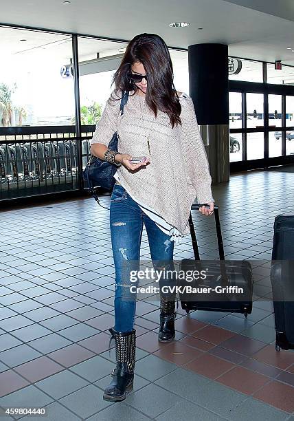 Selena Gomez is seen at Los Angeles International Airport on June 15, 2012 in Los Angeles, California.