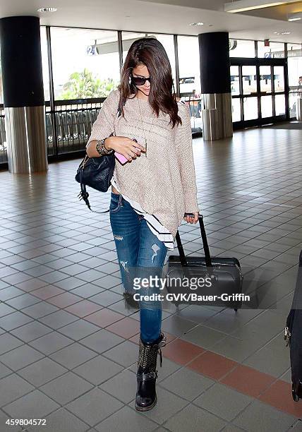 Selena Gomez is seen at Los Angeles International Airport on June 15, 2012 in Los Angeles, California.