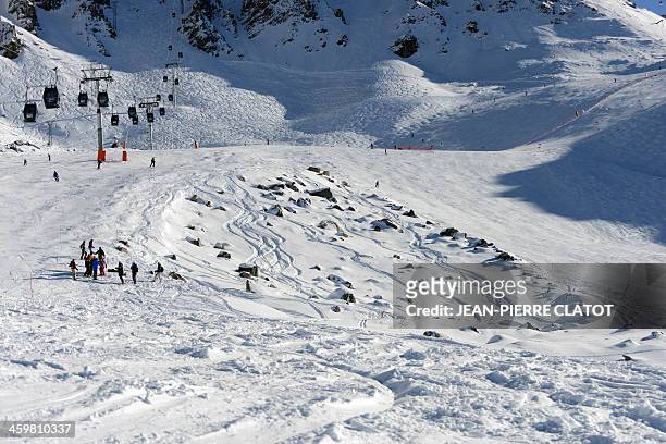 View taken on December 31, 2013 in the French Alps ski resort of Meribel shows the rocky part between two slopes where German retired Formula One...