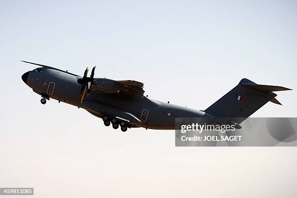 The first A 400M Atlas French military transport aircraft takes off from the French military airbase in Gao, northern Mali, on December 31 during its...