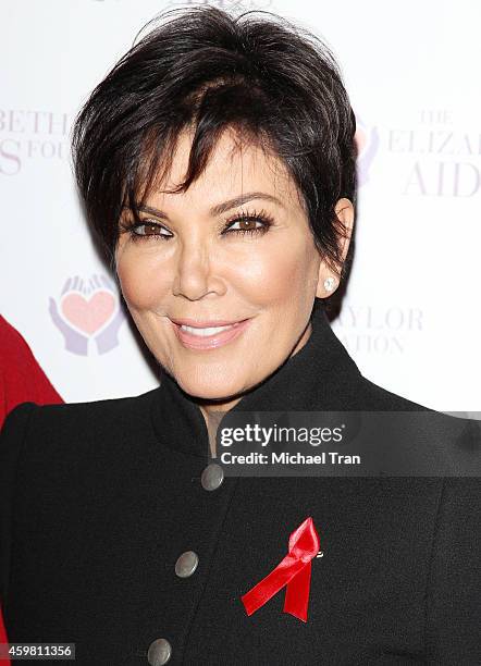Kris Jenner raises a toast for Elizabeth Taylor Foundation/World AIDS Day held at The Abbey on December 1, 2014 in West Hollywood, California.