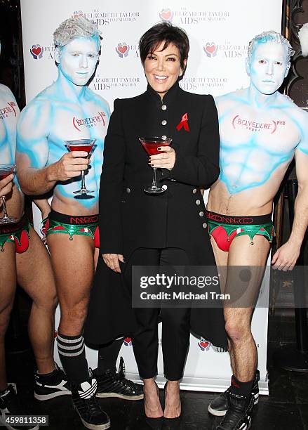 Kris Jenner raises a toast for Elizabeth Taylor Foundation/World AIDS Day held at The Abbey on December 1, 2014 in West Hollywood, California.