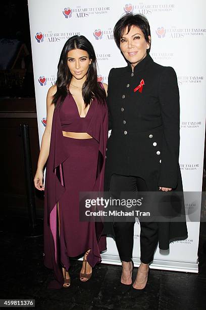 Kim Kardashian and Kris Jenner raise a toast for Elizabeth Taylor Foundation/World AIDS Day held at The Abbey on December 1, 2014 in West Hollywood,...