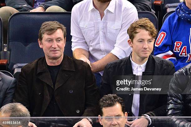 Wayne Gretzky and Ty Gretzky attend Tampa Bay Lighting vs New York Rangers game at Madison Square Garden on December 1, 2014 in New York City.