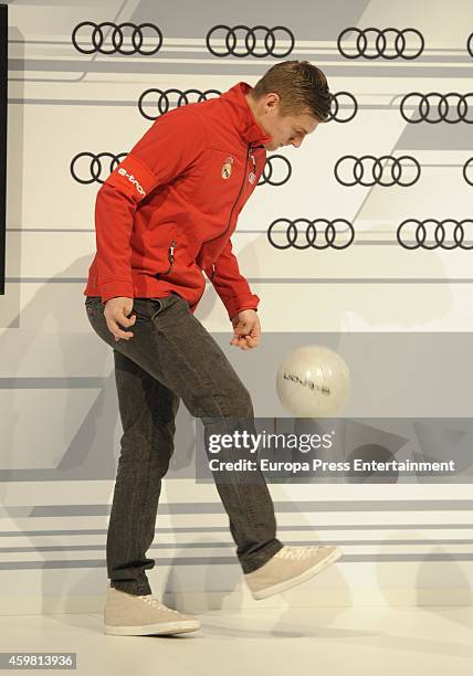 Real Madrid player Toni Kroos attends the car handover of Audi at the Ciudad Deportiva del Real Madrid on December 1, 2014 in Madrid, Spain.