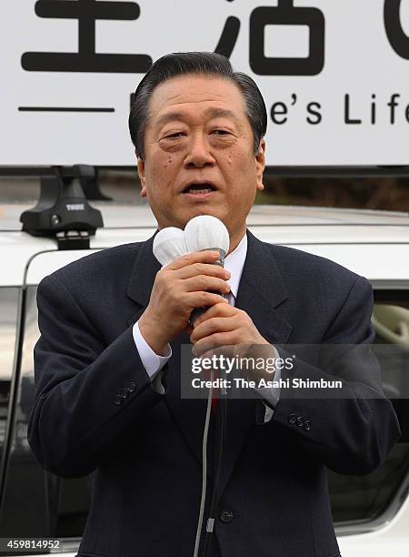 People's Life Party leader Ichiro Ozawa makes a street speech as the lower house election campaign officially kicks off on December 2, 2014 in...