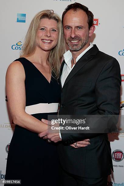 Nicolas Koenig with his wife Inke poses during the event 'Movie Meets Media' at Hotel Atlantic on December 1, 2014 in Hamburg, Germany.