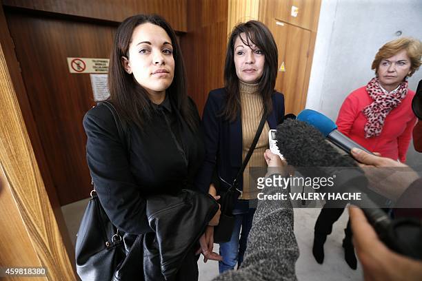 Manon Serrano and her mother Sophie Serrano answer journalists' questions, on December 1, 2014 at Grasse courthouse, after a hearing regarding the 12...