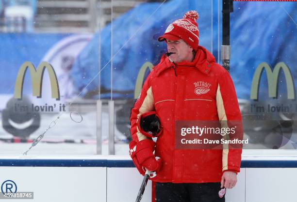 Head Coach Mike Babcock watches his team practice during 2014 Bridgestone NHL Winter Classic team practice session on December 31, 2013 at Michigan...