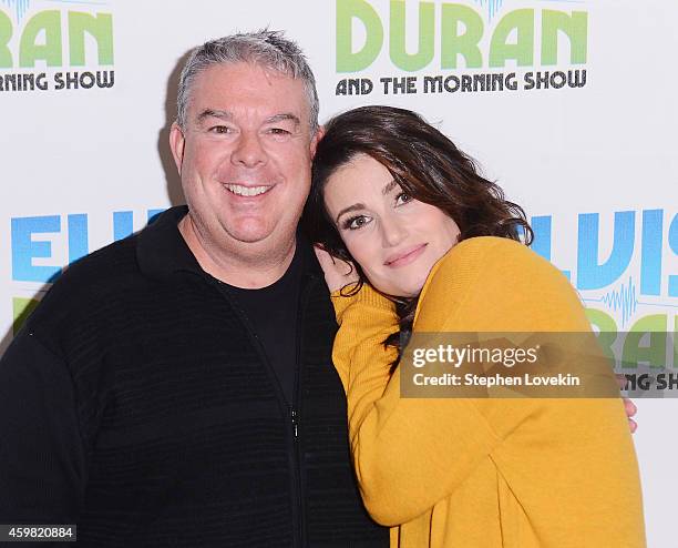 Radio personality Elvis Duran and singer/actress Idina Menzel attend "The Elvis Duran Z100 Morning Show" at Z100 Studio on December 1, 2014 in New...