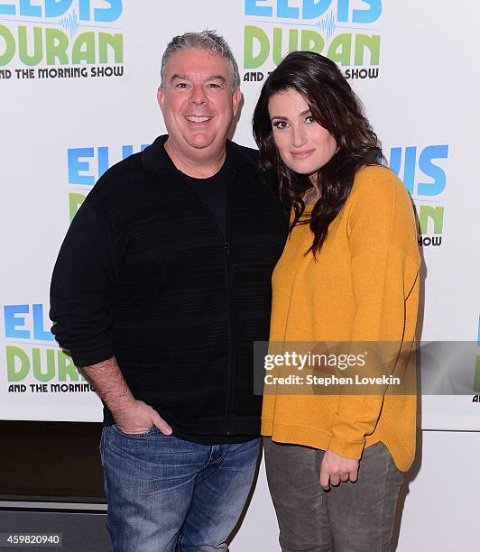 Radio personality Elvis Duran and singer/actress Idina Menzel attend "The Elvis Duran Z100 Morning Show" at Z100 Studio on December 1, 2014 in New...