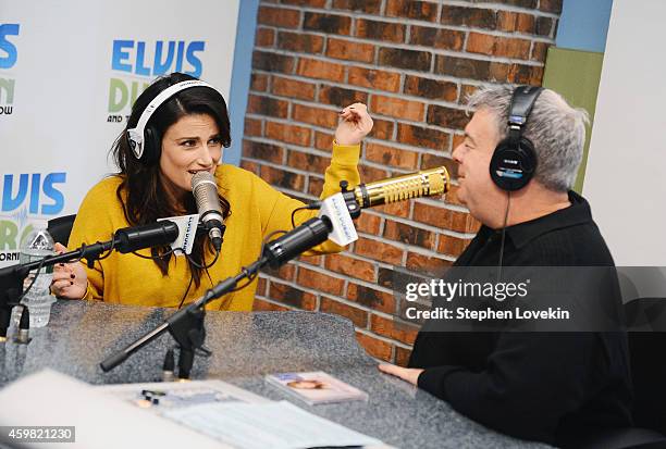 Singer/actress Idina Menzel and radio personality Elvis Duran attend "The Elvis Duran Z100 Morning Show" at Z100 Studio on December 1, 2014 in New...