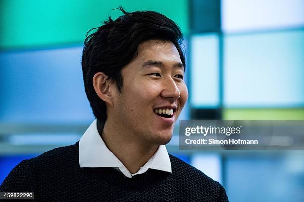 Heung-Min Son of Bayer Leverkusen smiles prior to the decision of DFB Court on the objection to the length of a 3 match ban in the DFB Cup which was...