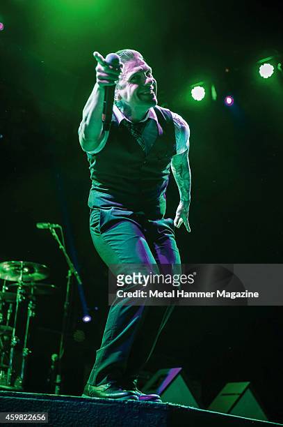 Frontman Brent Smith of American hard rock group Shinedown performing live on stage at Wembley Arena, on October 18, 2013.