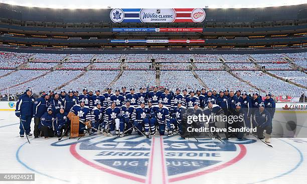 Members of the Toronto Maple Leafs pose for a team photo during the 2014 Bridgestone NHL Winter Classic team practice session on December 31, 2013 at...