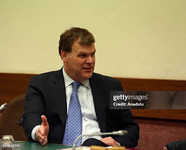 Canadian Foreign Minister John Baird is seen during a meeting with Turkish Foreign Minister Mevlut Cavusoglu in Brussels, Belgium on December 2, 2014.