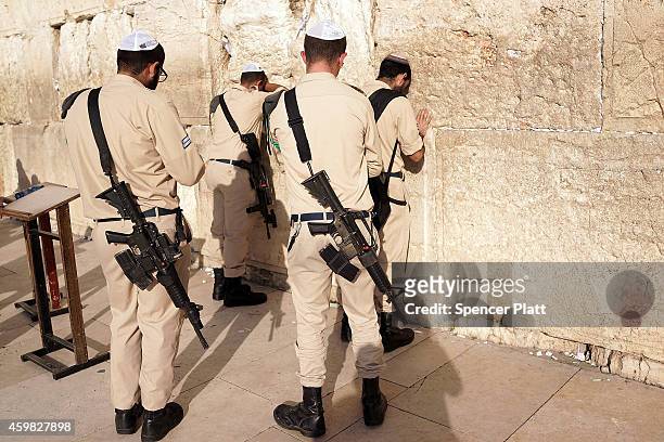 Members of the Israeli Air Force pray at the Western Wall in the Old City on December 02, 2014 in Jerusalem, Israel. As violence continues in Israel,...
