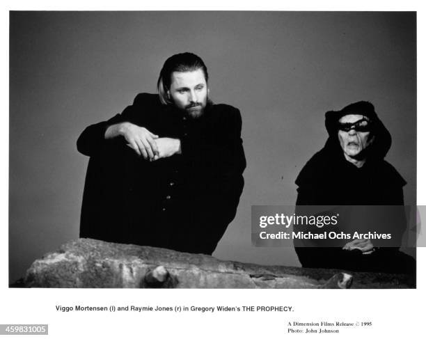 Actor Viggo Mortensen and Raymie Jones on set of the movie "The Prophecy" , circa 1995.