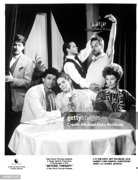 Tom Conti, Jeff Goldblum, Julie Hagerty , Cris Campion, Christopher Guest and Glenda Jackson pose on set of the movie "Beyond Therapy " , circa 1987.