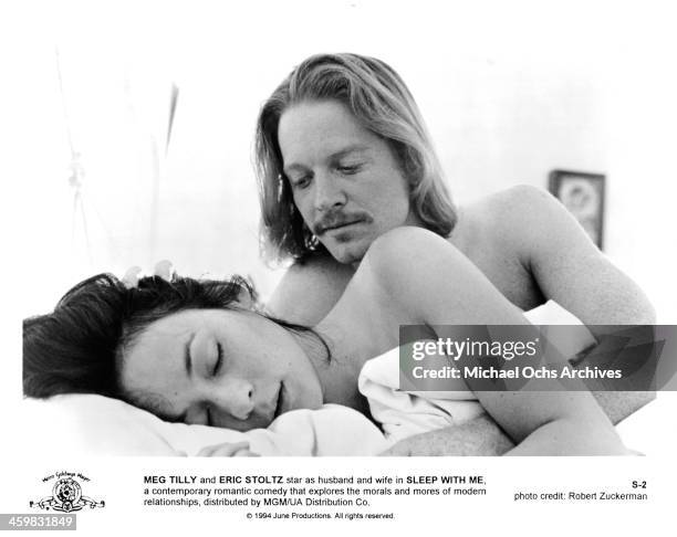 Actress Meg Tilly and Eric Stoltz on set of the movie " Sleep with Me " , circa 1994.