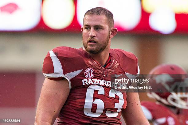 Dan Skipper of the Arkansas Razorbacks walks onto the field during a game against the Ole Miss Rebels at Razorback Stadium on November 22, 2014 in...