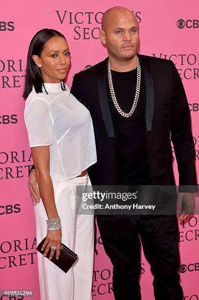 Singer Melanie Brown and husband Stephen Belafonte attend the pink carpet of the 2014 Victoria's Secret Fashion Show on December 2, 2014 in London,...