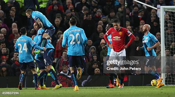 Steven Nzonzi of Stoke City celebrates scoring their first goal during the Barclays Premier League match between Manchester United and Stoke City at...