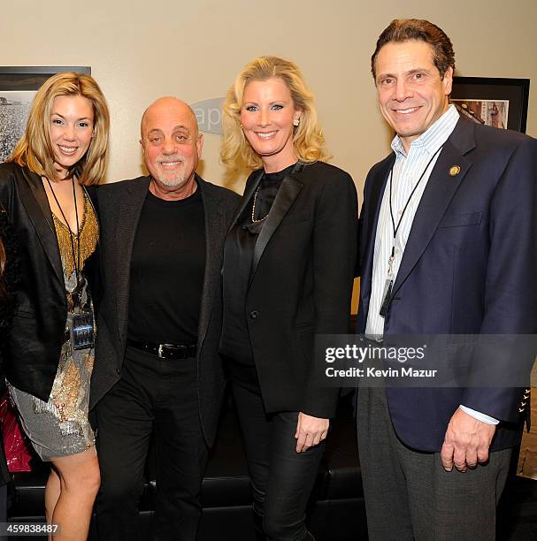 Alexis Roderick, Billy Joel, Sandra Lee, and New York Governor Andrew Cuomo pose backstage at the Billy Joel New Year's Eve Concert at the Barclays...