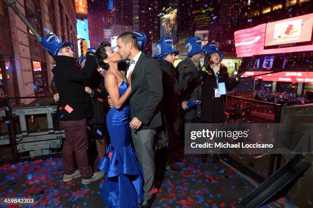 Kat Graham and finance Cottrell Guidry celebrate the New Year with NIVEA at the official Hard Rock Café party Times Square on December 31, 2013 in...