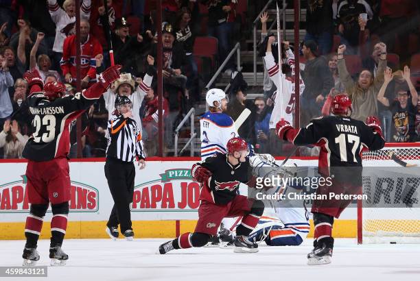 Mikkel Boedker of the Phoenix Coyotes celebrates after scoring a third period goal past goaltender Ilya Bryzgalov of the Edmonton Oilers in the NHL...