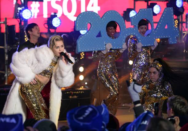Miley Cyrus performs as thousands of revelers gather in New York's Times Square to celebrate the ball drop at the annual New Year's Eve celebration...