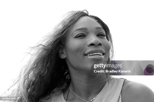 Serena Williams of the USA poses for a photo as she travels down the Brisbane River on a cruise boat during day four of the 2014 Brisbane...