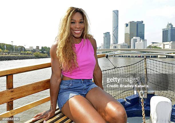 Serena Williams of the USA poses for a photo as she travels down the Brisbane River on a cruise boat during day four of the 2014 Brisbane...