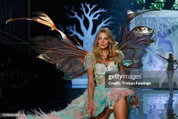 Eniko Mahalik on the runway at the 2014 Victoria's Secret Runway Show - Swarovski Crystal Looks at Earl's Court Exhibition Centre on December 2, 2014...