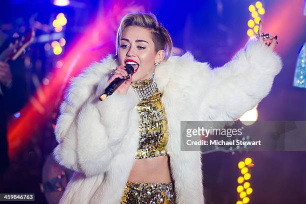 Singer Miley Cyrus performs at Dick Clark's New Year's Rockin' Eve with Ryan Seacrest 2014 in Times Square on December 31, 2013 in New York City.