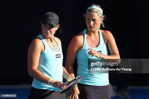 Abigail Guthrie of New Zealand and Sacha Jones of Australia look on in the doubles match against Karolina Pliskova and Kristyna Pliskova of Czech...