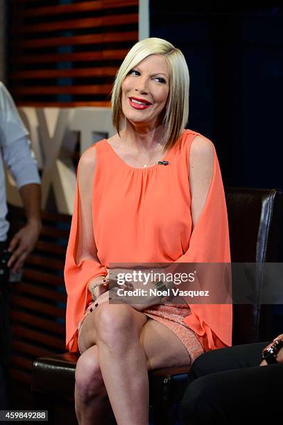 Tori Spelling visits "Extra" at Universal Studios Hollywood on December 2, 2014 in Universal City, California.