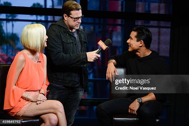 Tori Spelling, Dean McDermott and Mario Lopez visit "Extra" at Universal Studios Hollywood on December 2, 2014 in Universal City, California.