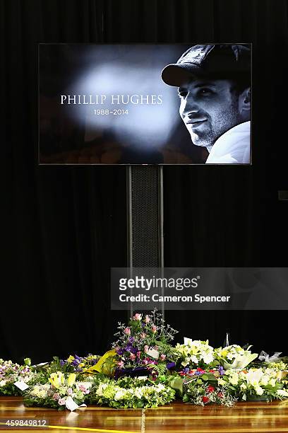 Flowers given to the Hughes family are laid inside the Macksville High School Stadium ahead of the Funeral Service for Phillip Hughes on December 3,...
