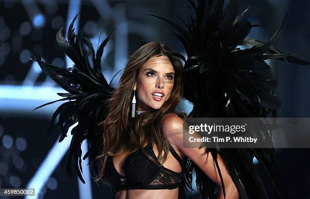 Alessandra Ambrosio walks the runway at the annual Victoria's Secret fashion show at Earls Court on December 2, 2014 in London, England.