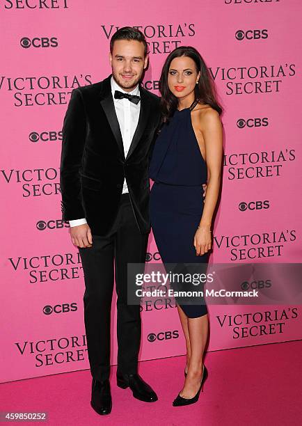 Liam Payne and Sophia Smith attend the annual Victoria's Secret fashion show at Earls Court on December 2, 2014 in London, England.