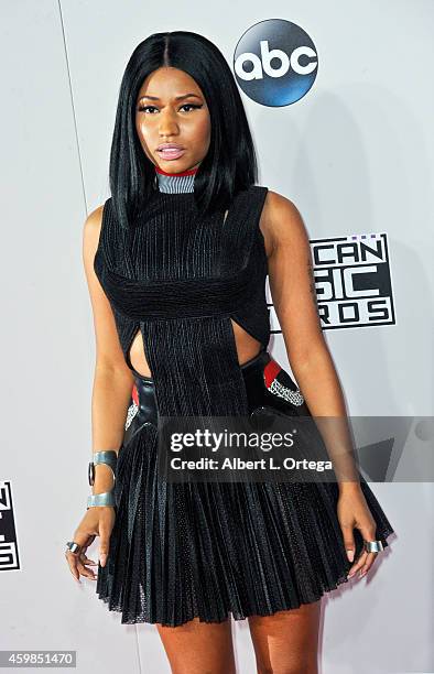 Singer Nicki Minaj arrives for the 42nd Annual American Music Awards held at Nokia Theatre L.A. Live on November 23, 2014 in Los Angeles, California.