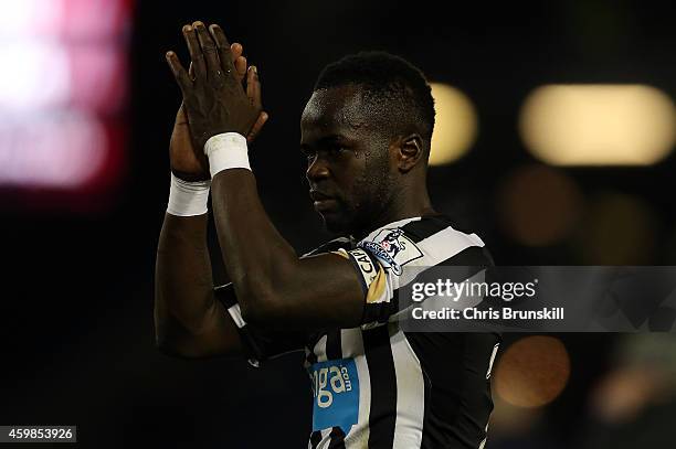 Cheick Tiote of Newcastle United applauds the supporters following the Barclays Premier League match between Burnley and Newcastle United at Turf...