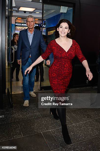 Television personalities Anthony Bourdain and Nigella Lawson enter the "Good Morning America" taping at the ABC Times Square Studios on December 2,...