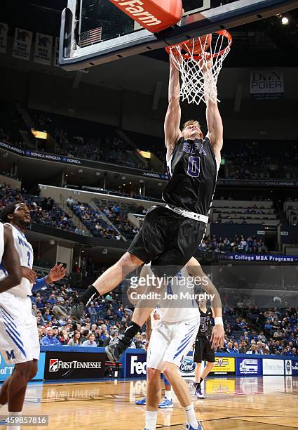 Thomas Walkup of the Stephen F. Austin Lumberjacks dunks the ball against the Memphis Tigers on December 2, 2014 at FedExForum in Memphis, Tennessee....
