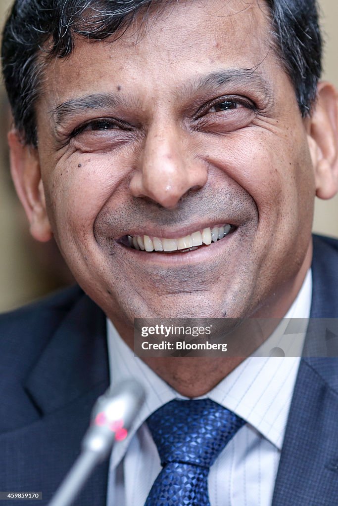 Reserve Bank of India Governor Rajan Unveils Interest-Rate Decision And Images Of Market Reactions