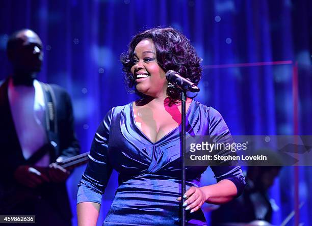 Singer Jill Scott performs onstage at the Tenth Annual UNICEF Snowflake Ball at Cipriani Wall Stree on December 2, 2014 in New York City.