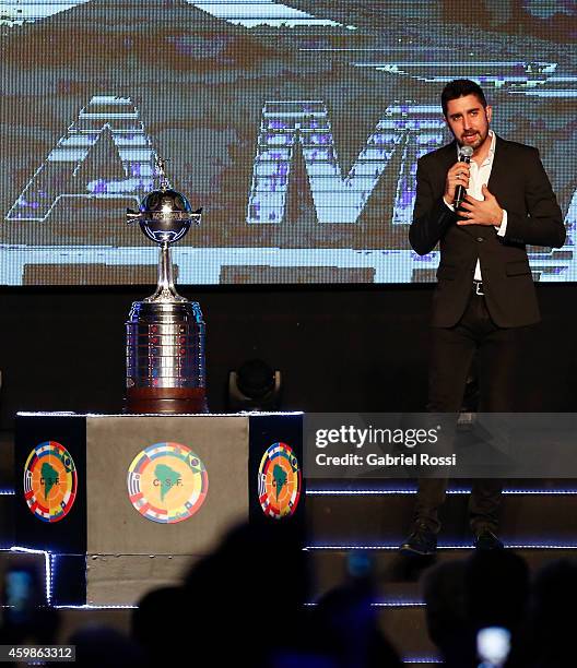 Spanish Singer Alex Ubago performs during the Official Draw of the 56th Copa Bridgestone Libertadores at Conmebol Convention Center on December 2,...