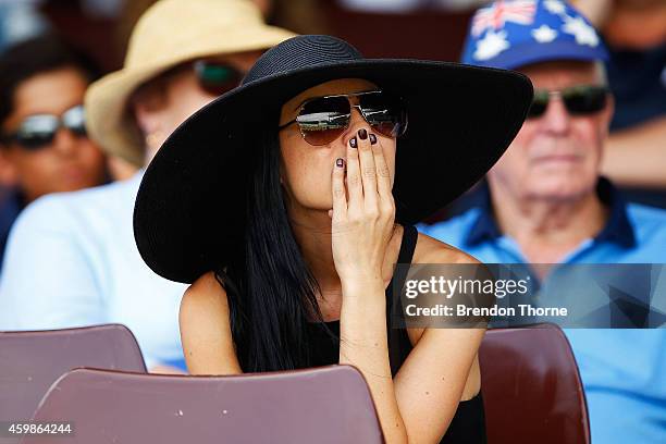 People gather to watch the funeral service held in Macksville for Australian cricketer Phillip Hughes at the Sydney Cricket Ground on December 3,...