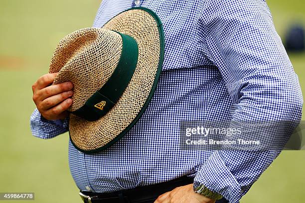 Mourners pay their respects as people gather to watch the funeral service held in Macksville for Australian cricketer Phillip Hughes at the Sydney...